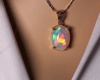 Natural Large Ethiopian Opal Necklace handmade with a genuine fire opal oval pendant in 14k solid gold with a delicate gold chain necklace